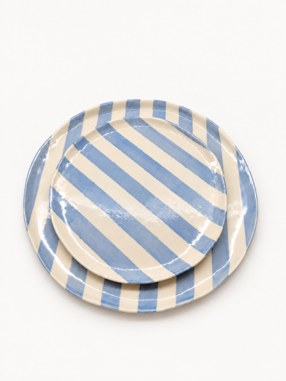 Handmade baby blue stripe dinner and side plate set, stacked