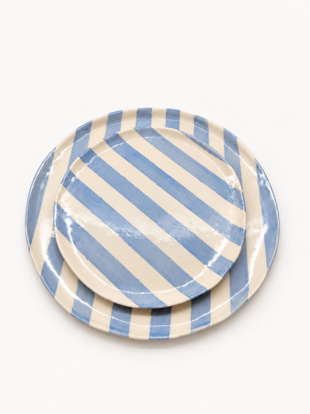 Handmade baby blue stripe dinner and side plate set, stacked