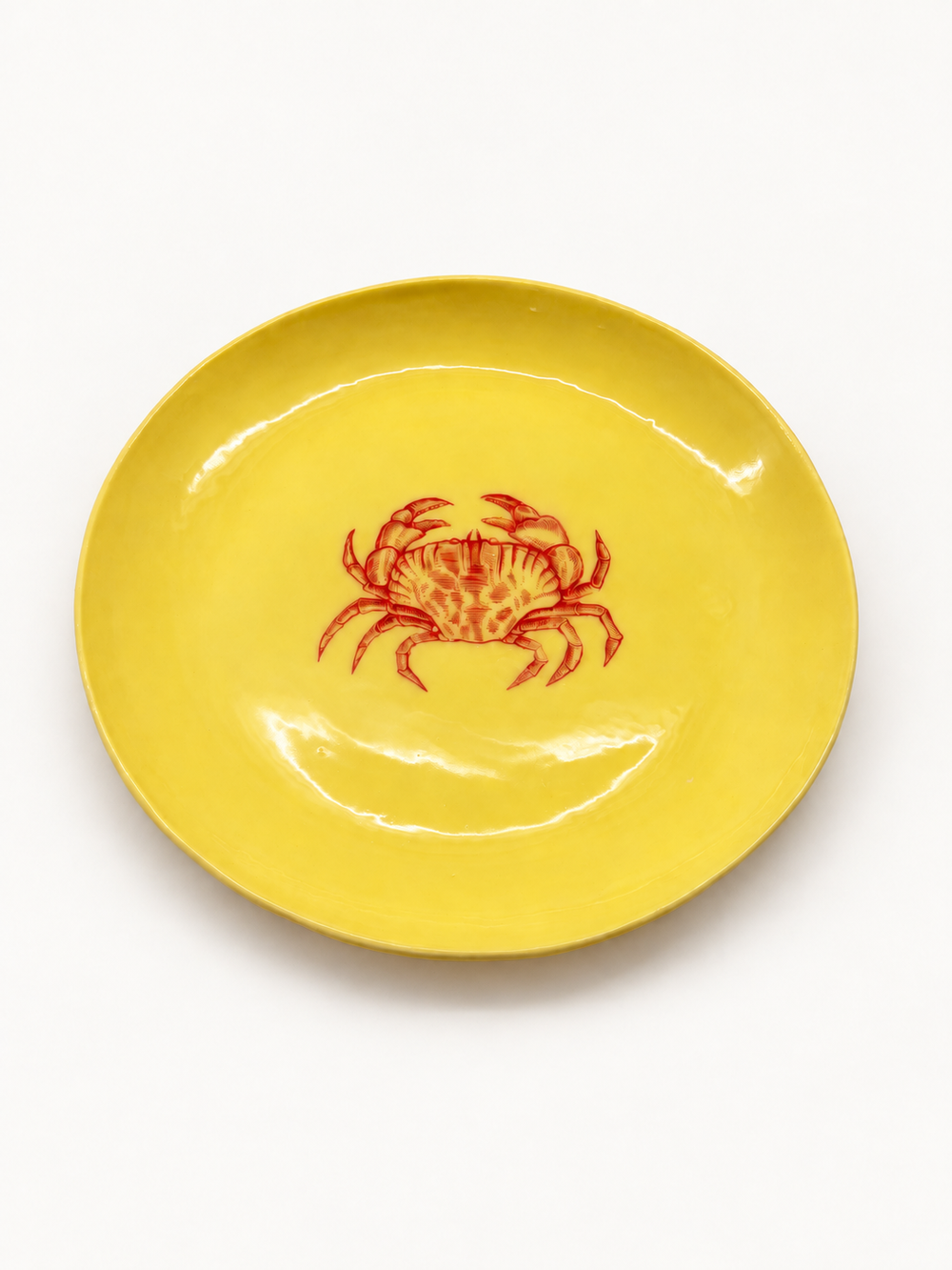 Butter-yellow handmade crab serving plate, approximately 28 cm