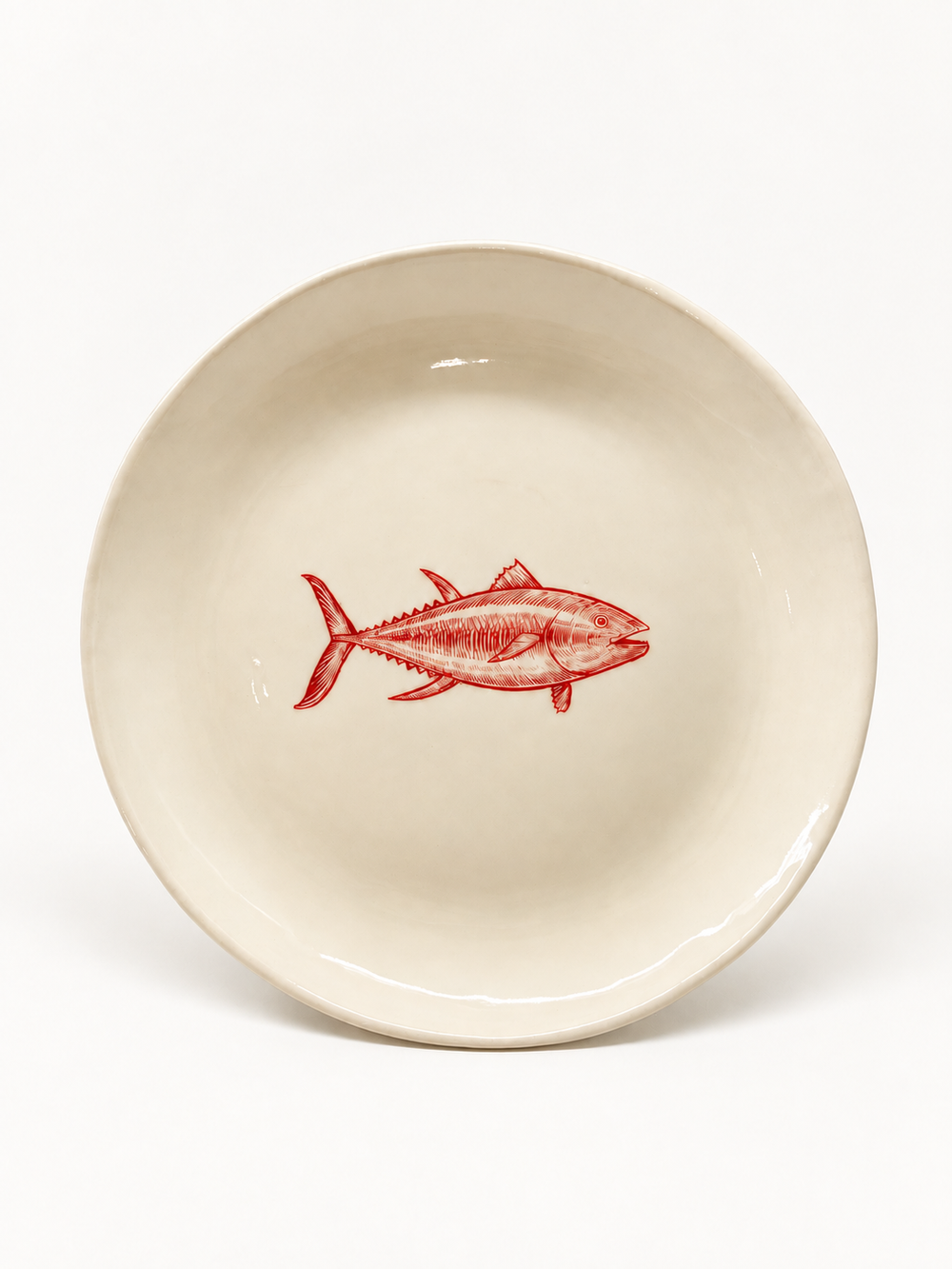 Handmade ivory fish plate with red motif, approximately 27 cm