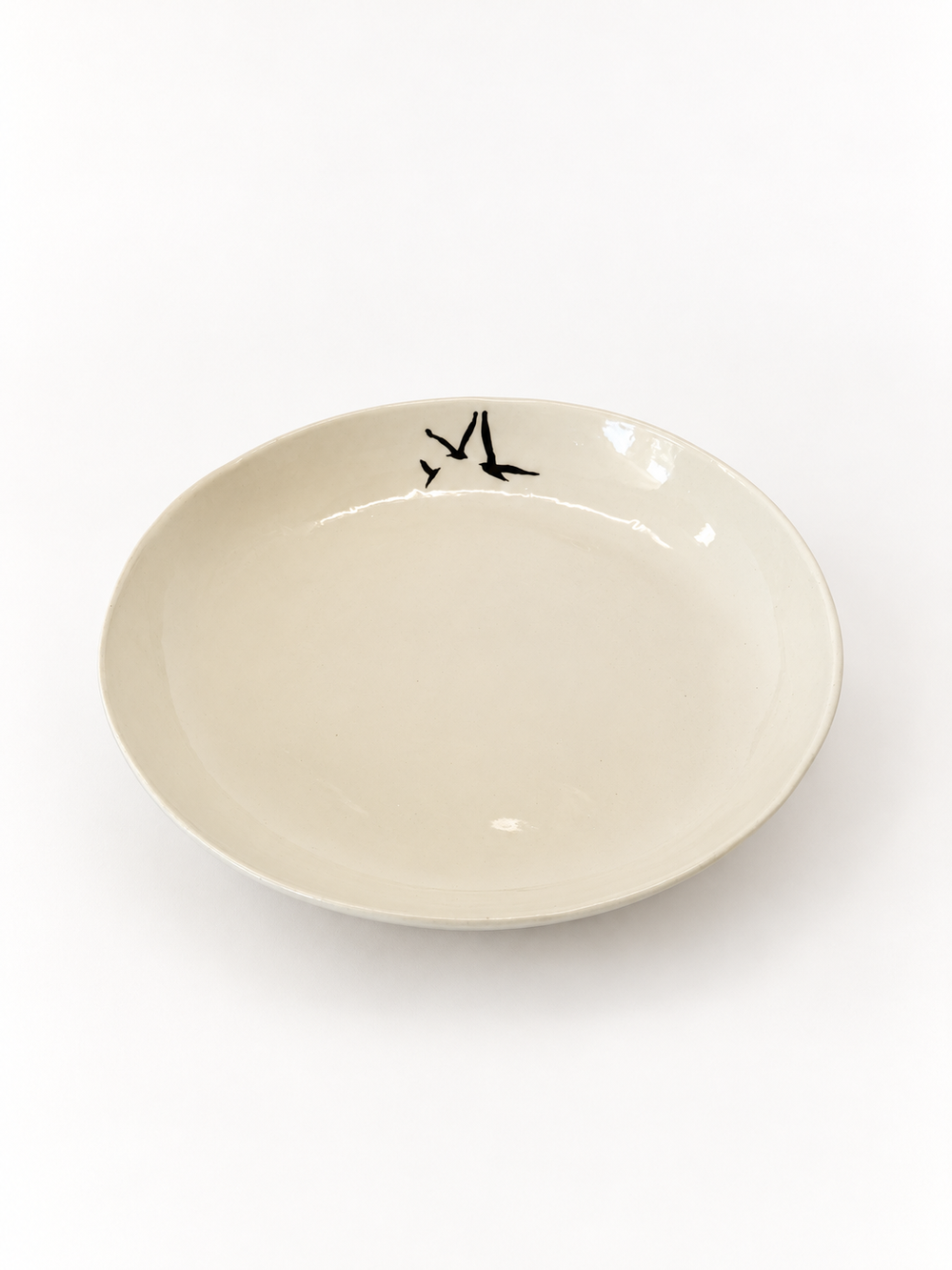 Angled view of handmade Birds Serving Bowl, approximately 27 cm