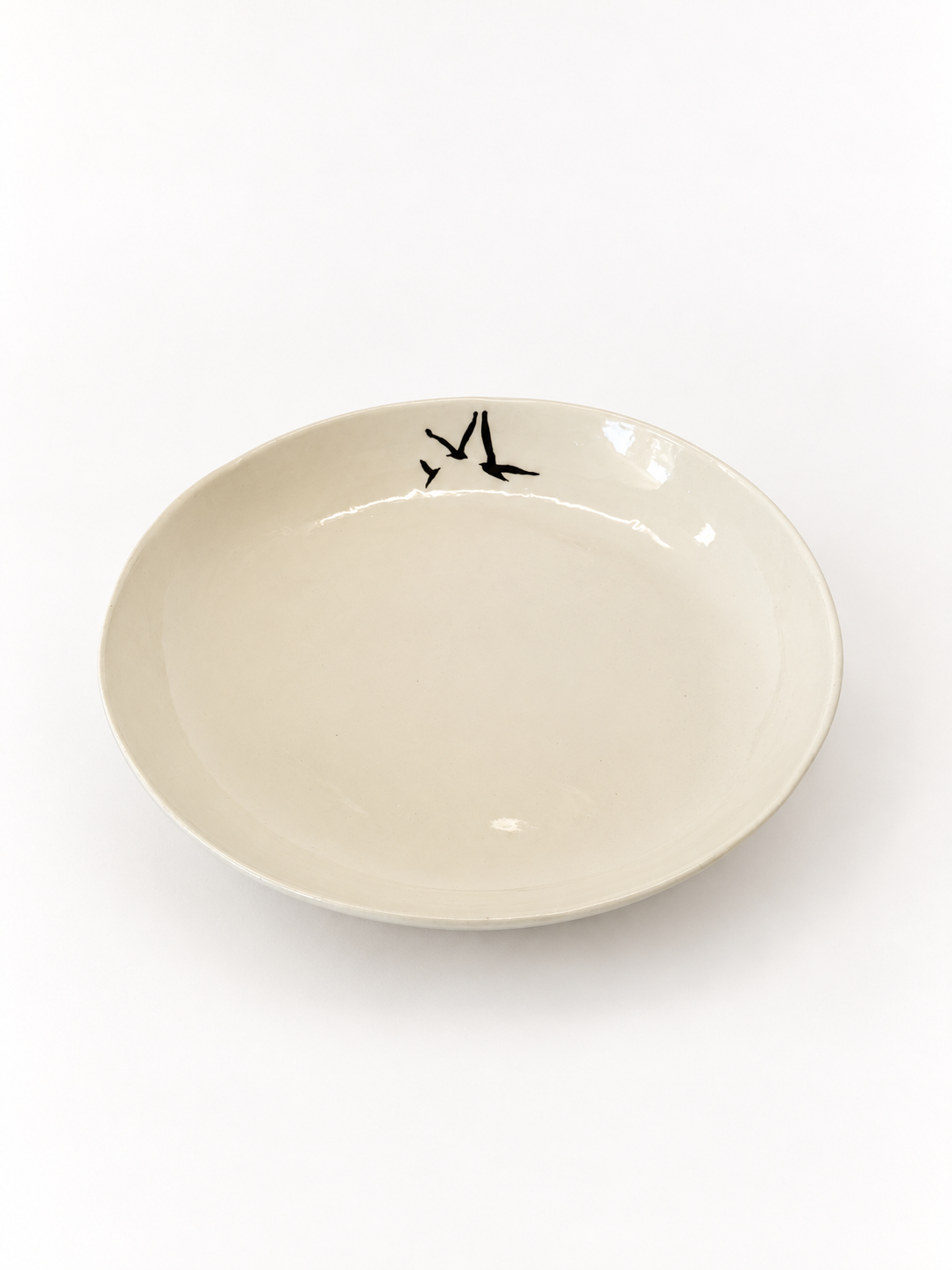 Angled view of handmade Birds Serving Bowl, approximately 27 cm