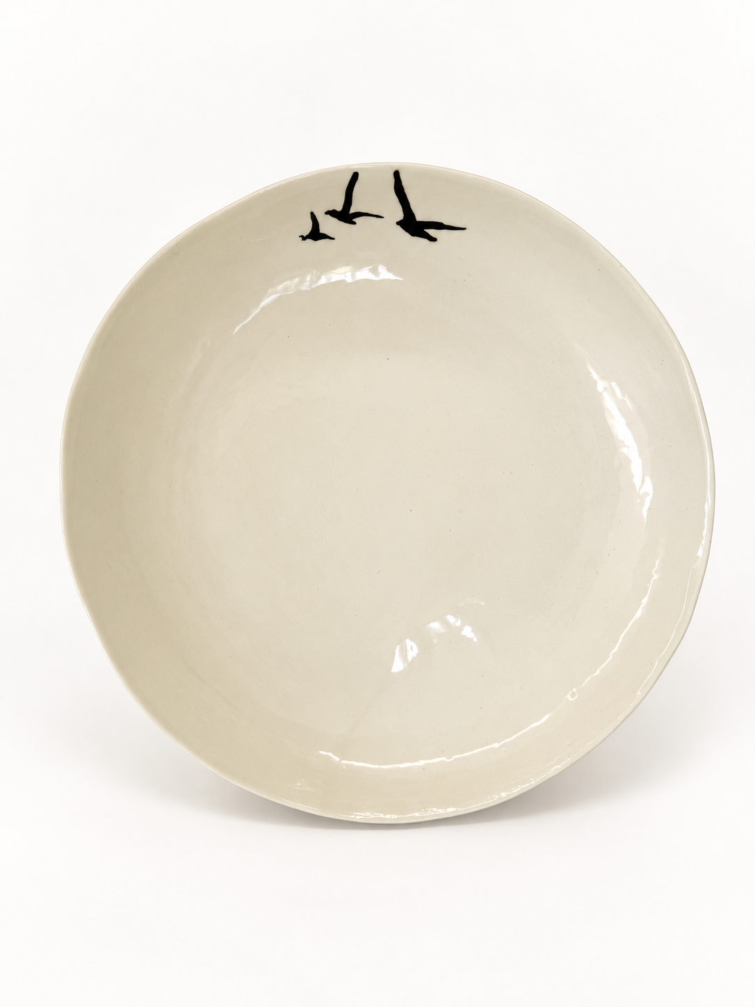 Second handmade Birds Serving Bowl showing natural variation