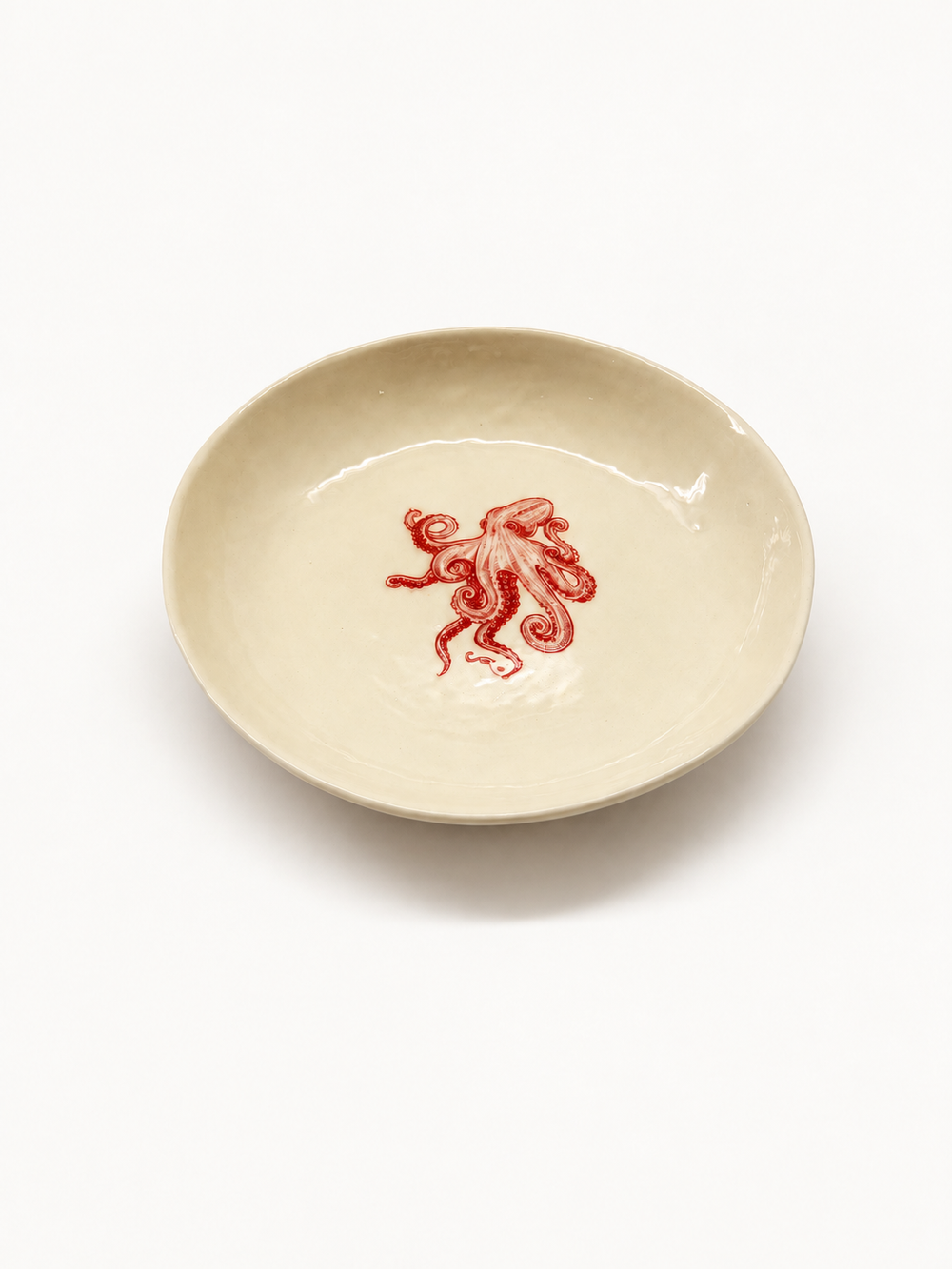 Angled view of handmade octopus pasta bowl